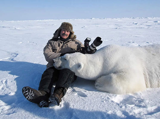 Peter Lourie and a tranquilized polar bear